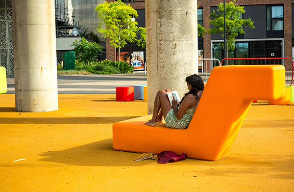 An orange seat in Royal Albert Wharf