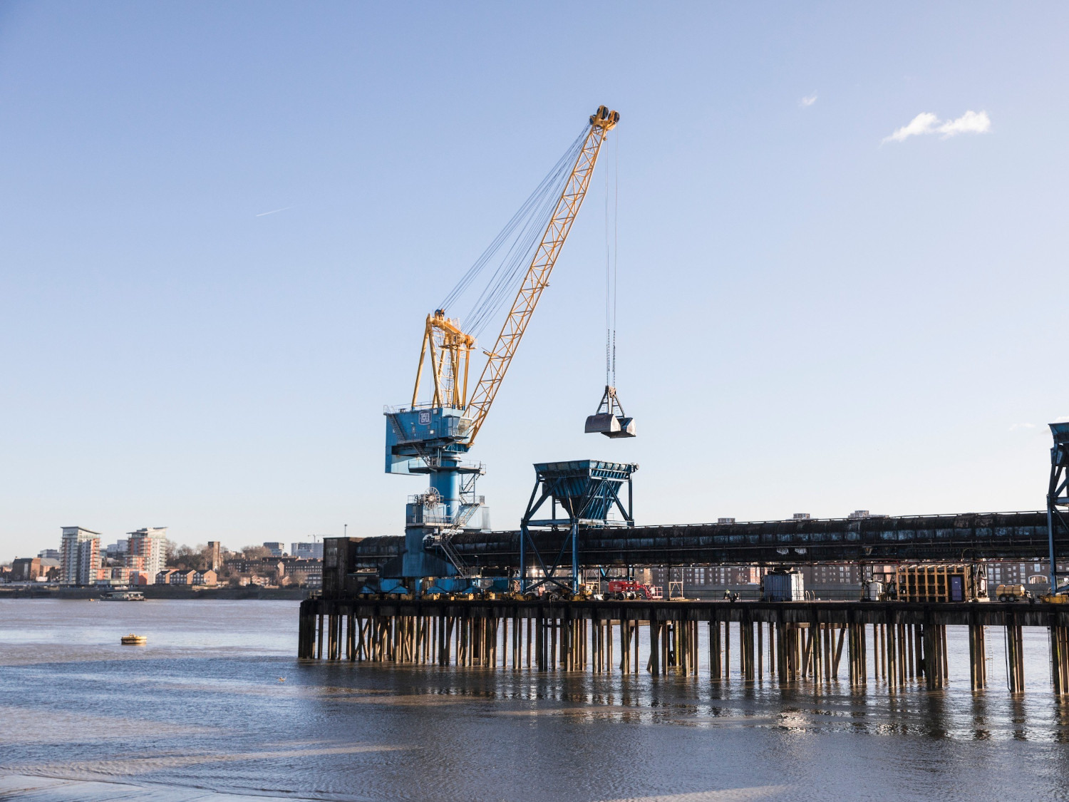 A crane on the pier at the Tate & Lyle factory