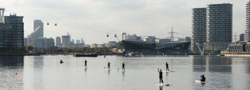 Overview of Royal Victoria Dock with the Crystal, with wakeboarders on the water