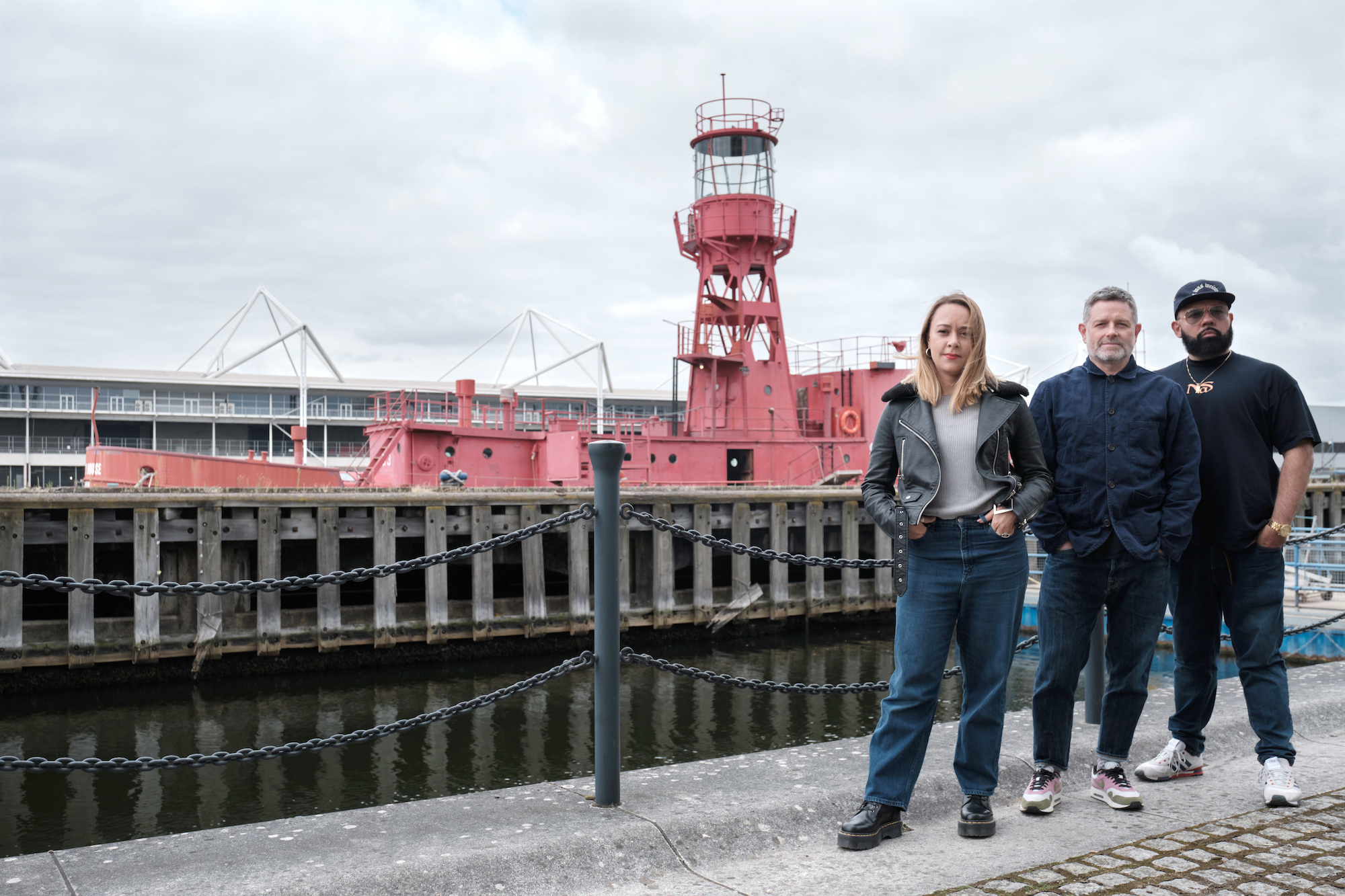 The ARRIVAL team outside Lightship 93, a historic lighthouse vessel in the Royal Docks