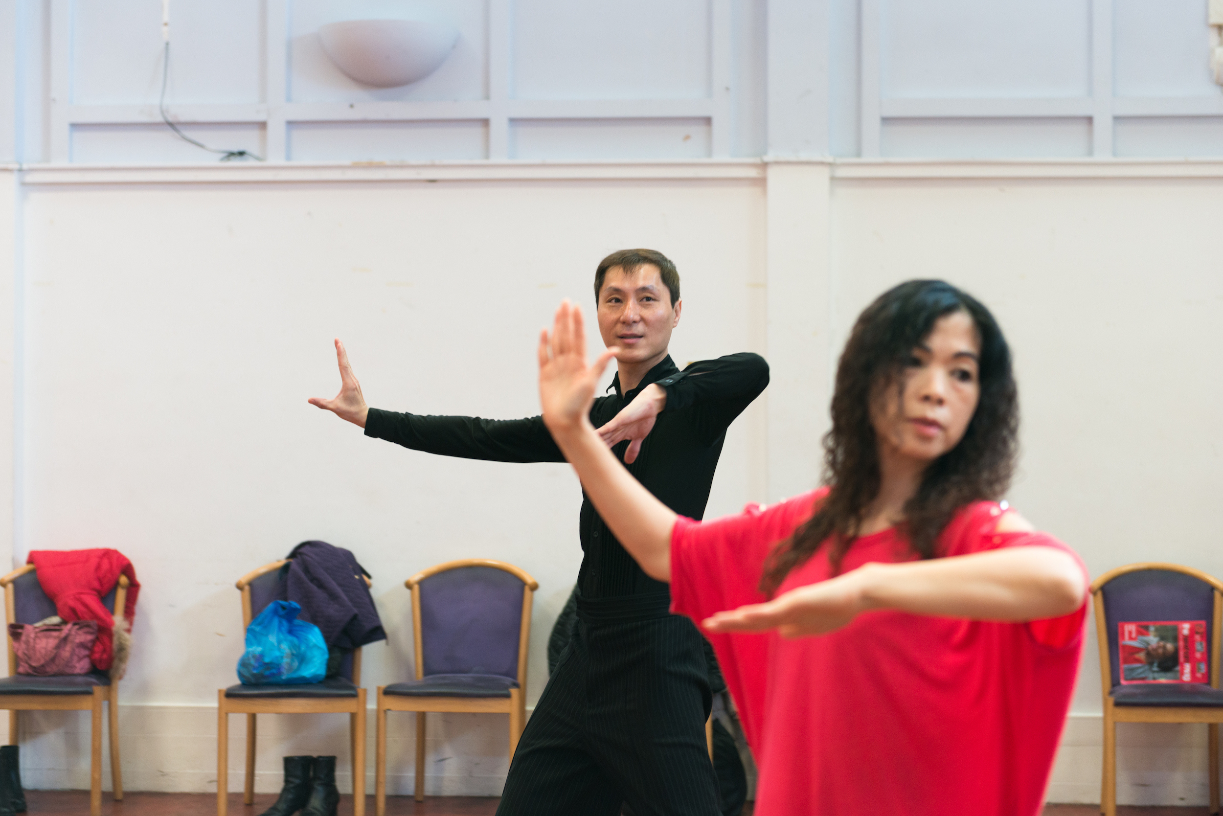 Man and woman dancing in hall