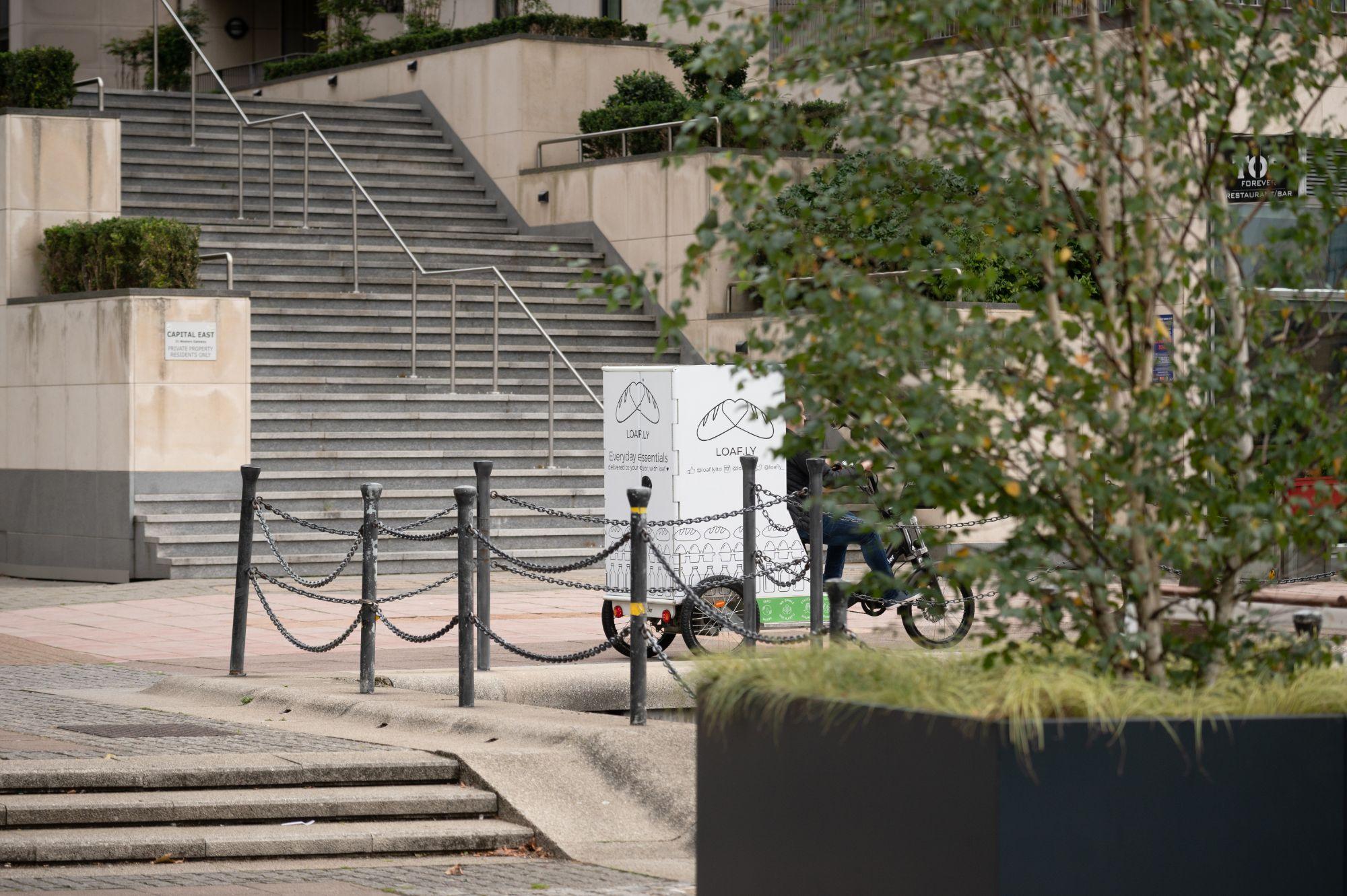 Loafly bike among trees in the Royal Docks