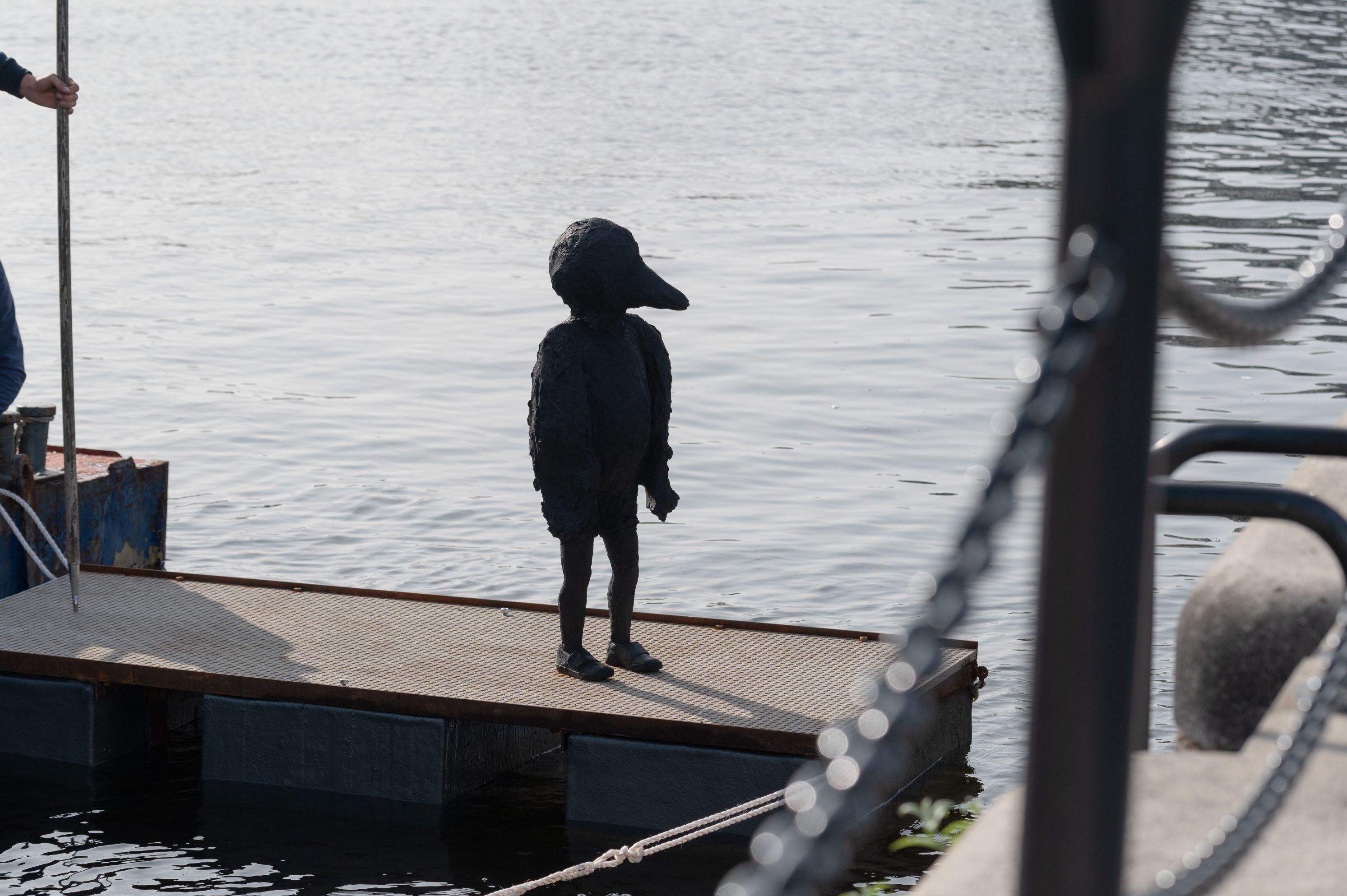 Statue in Royal Victoria Dock called Bird Boy