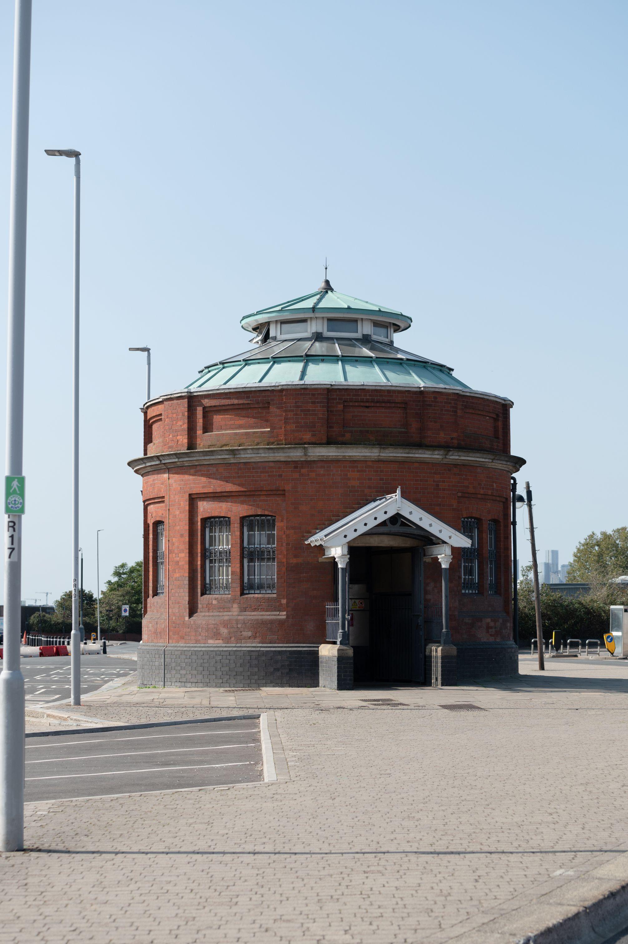 Redbrick round structure that is the entrance to the Woolwich Foot Tunnel