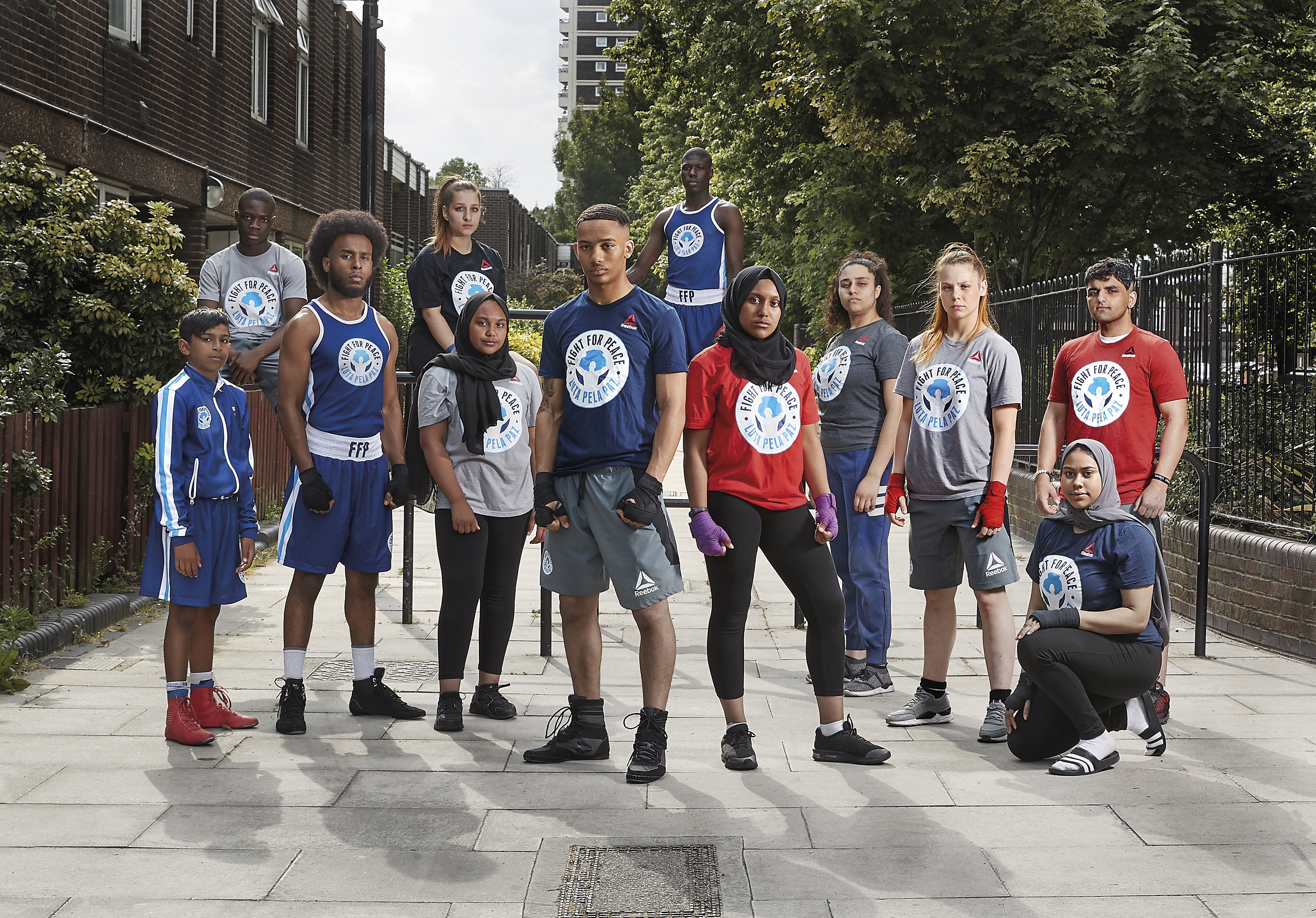 Group shot of young people in Fight for Peace t-shirts