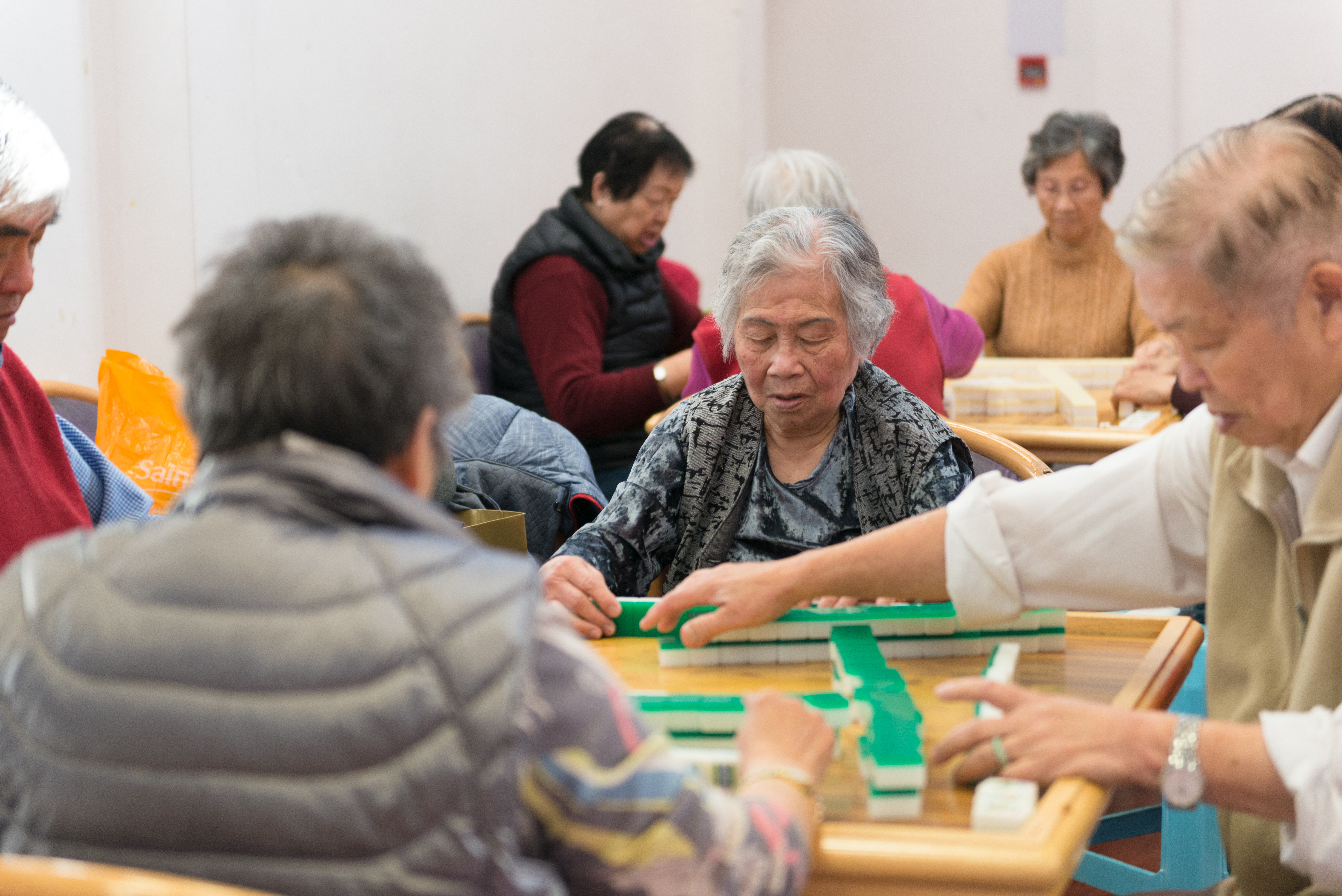 Elderly people playing mahjong