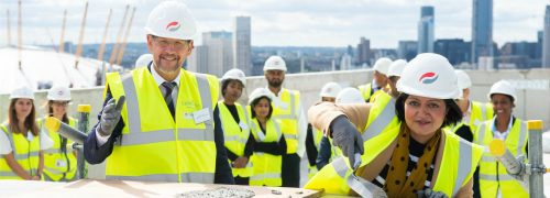 Newham Mayor celebrates topping out ceremony at Brunel Street Works