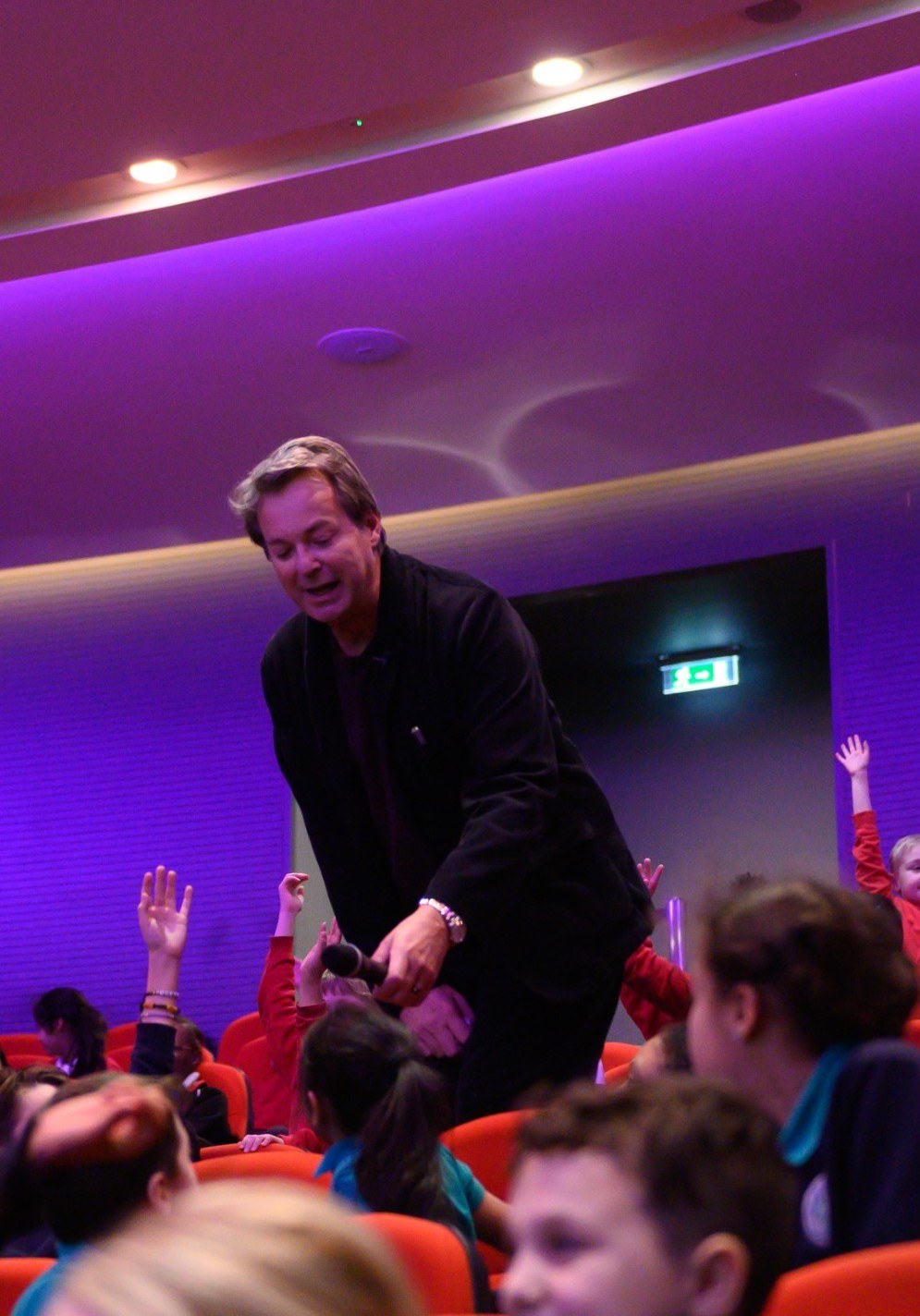 Julian CLary amongst audience members at Newham Word Festival
