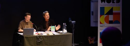 Julian Clary in front of an audience at Newham Word Festival