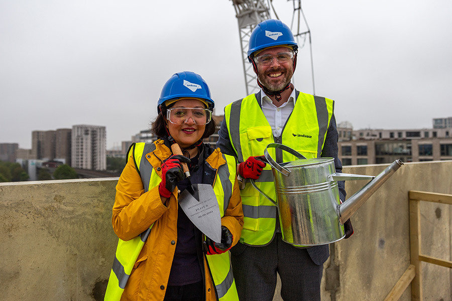 Mayor of Newham Rokhsana Fiaz and Deputy Mayor for Housing and Residential Development Tom Copley at a topping out ceremony in Silvertown