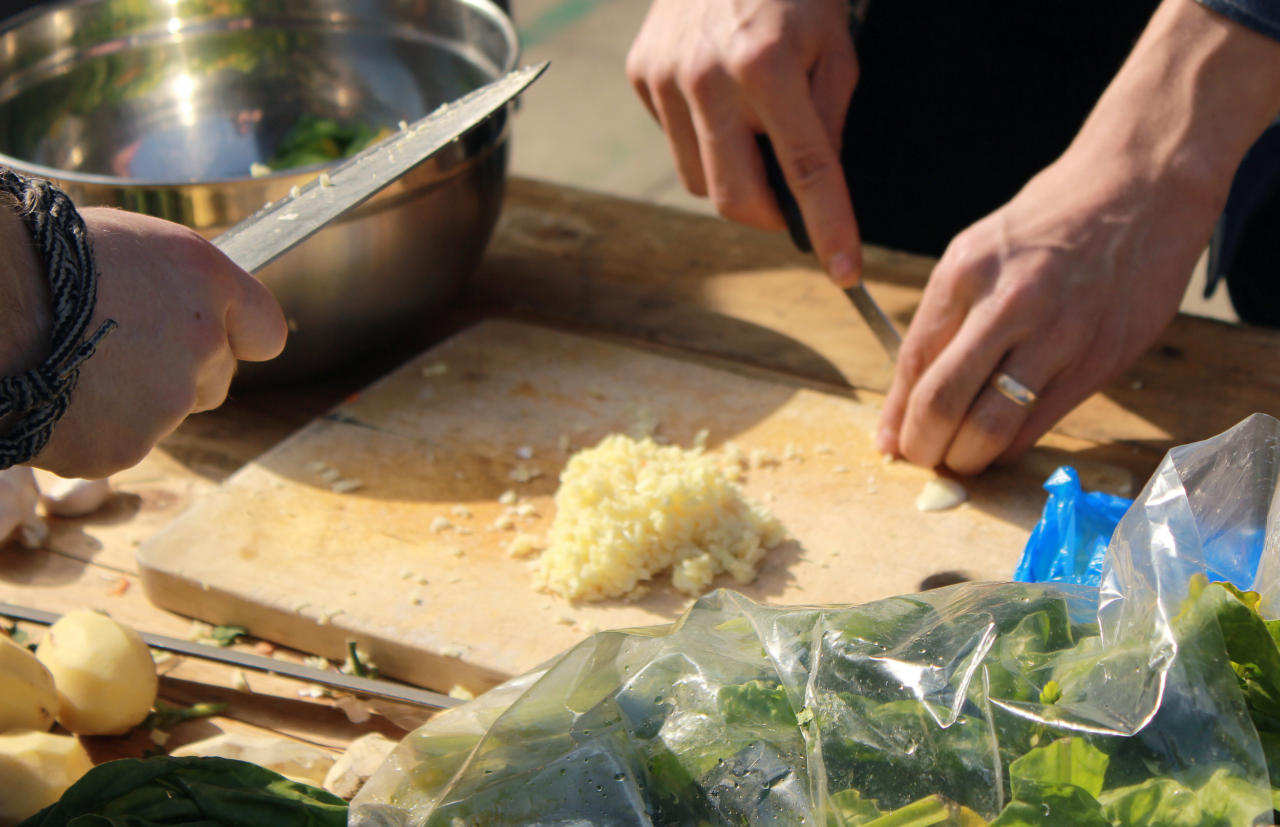 Vegetables being chopped on a chopping board