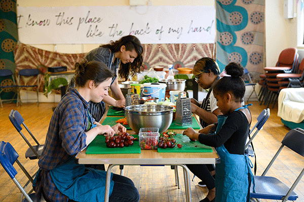 People preparing food at community centre