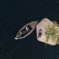 Copenhagen Islands in Denmark, showing a miniature island with a boat tethered to it