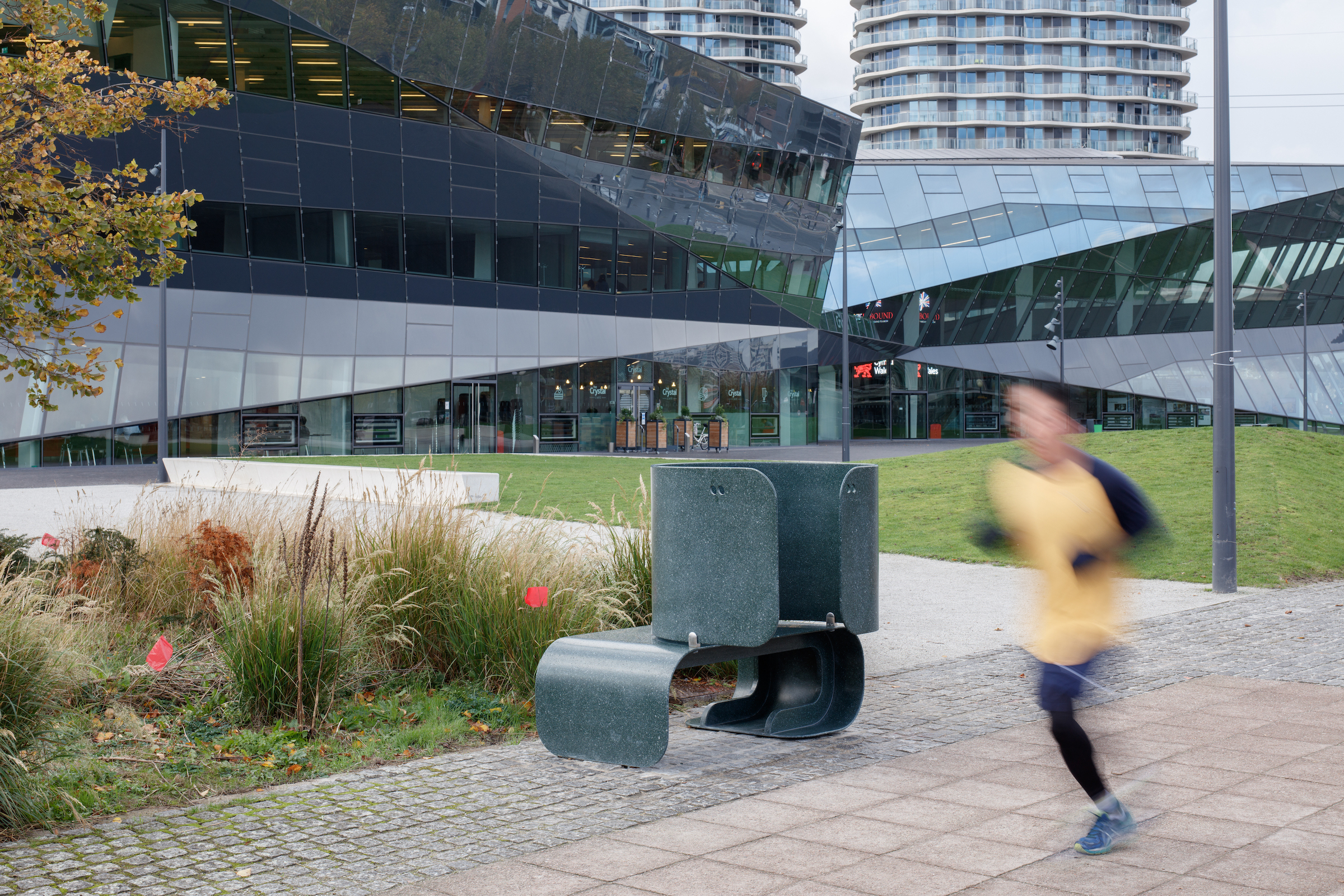 A jogger running past The Crystal