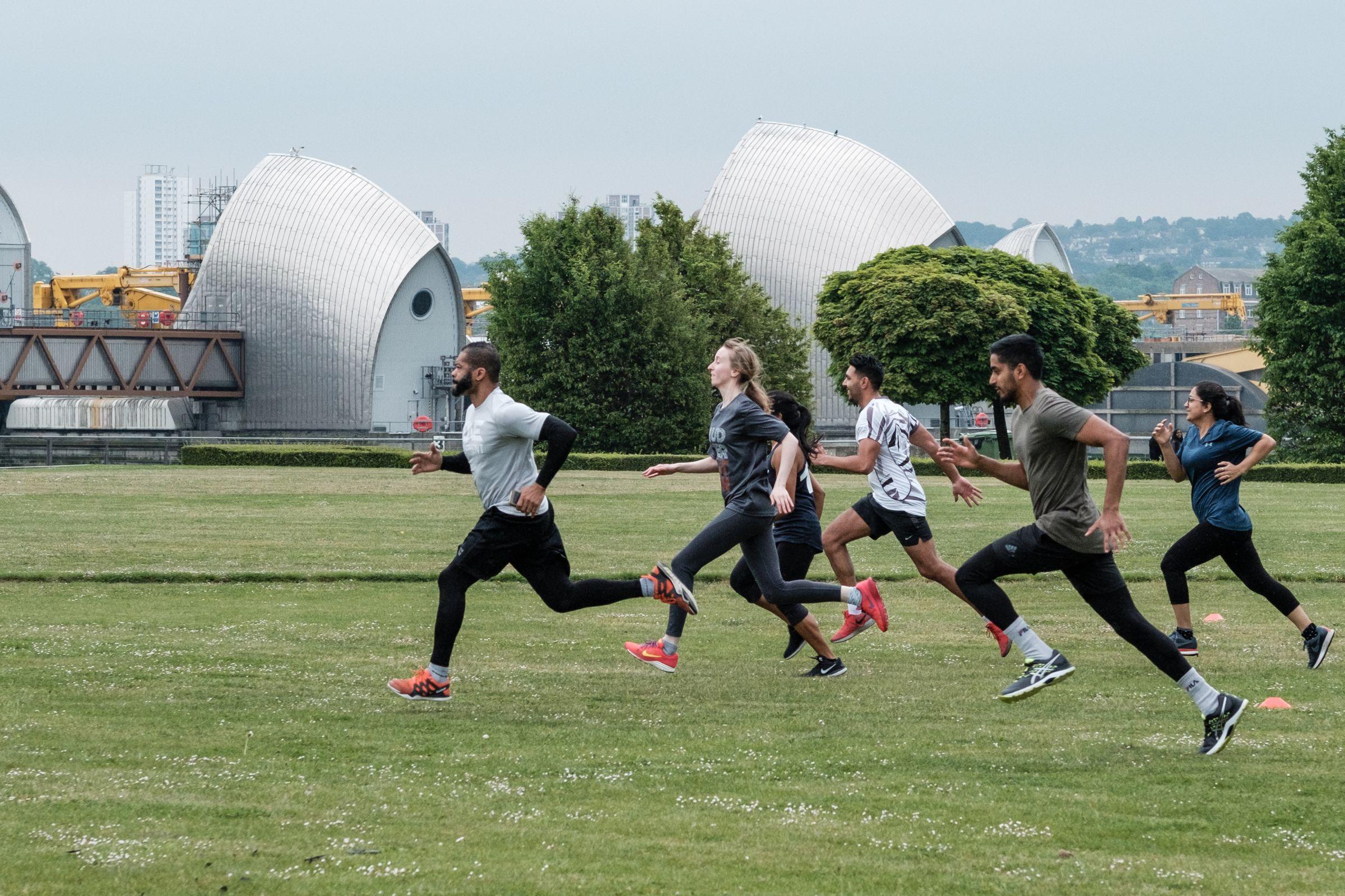 Runners at Thames Barrier Park