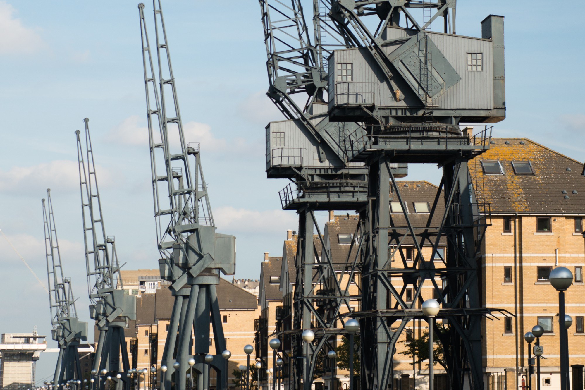 Cranes along the edge of the dock