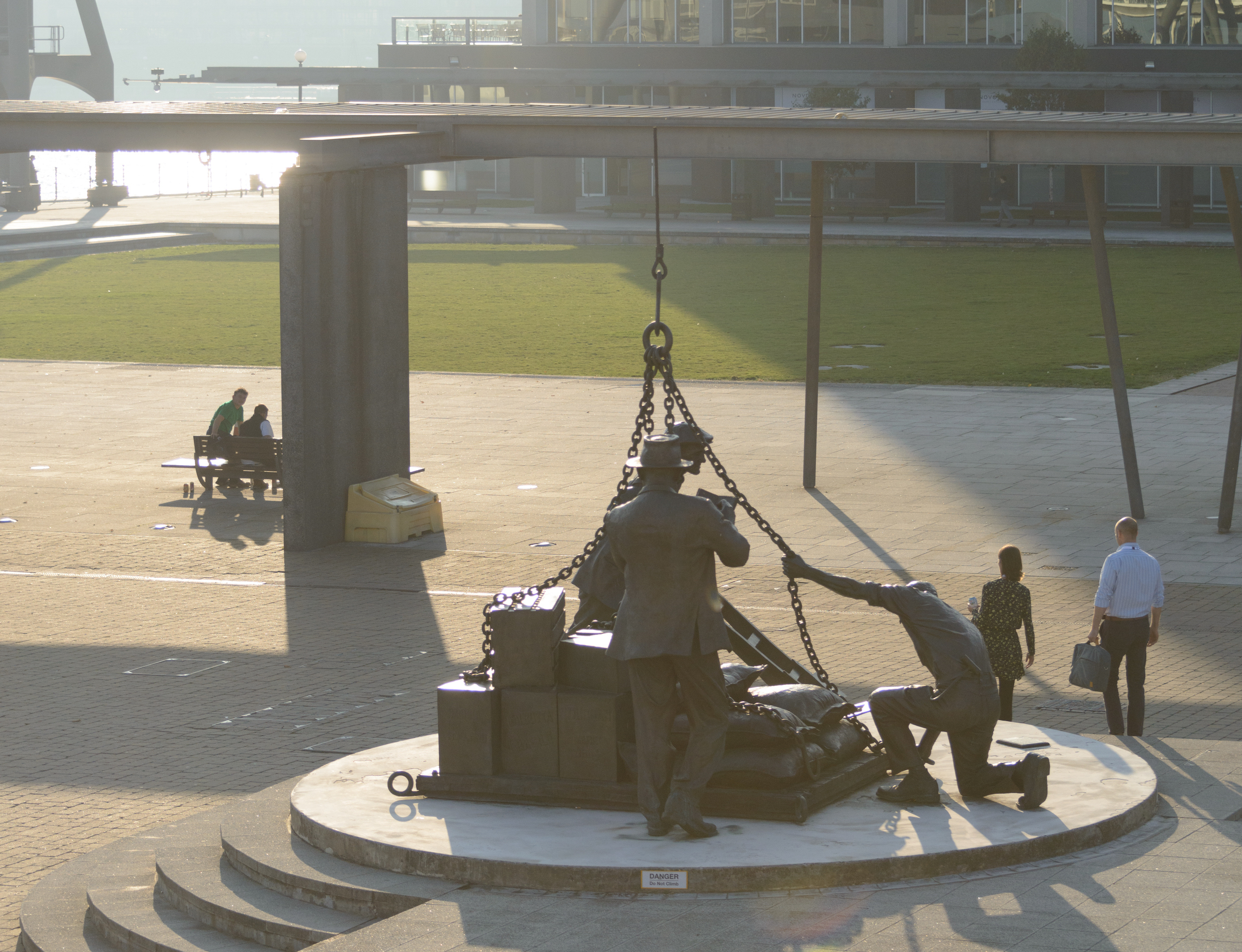 Statue of dockworkers with cargo